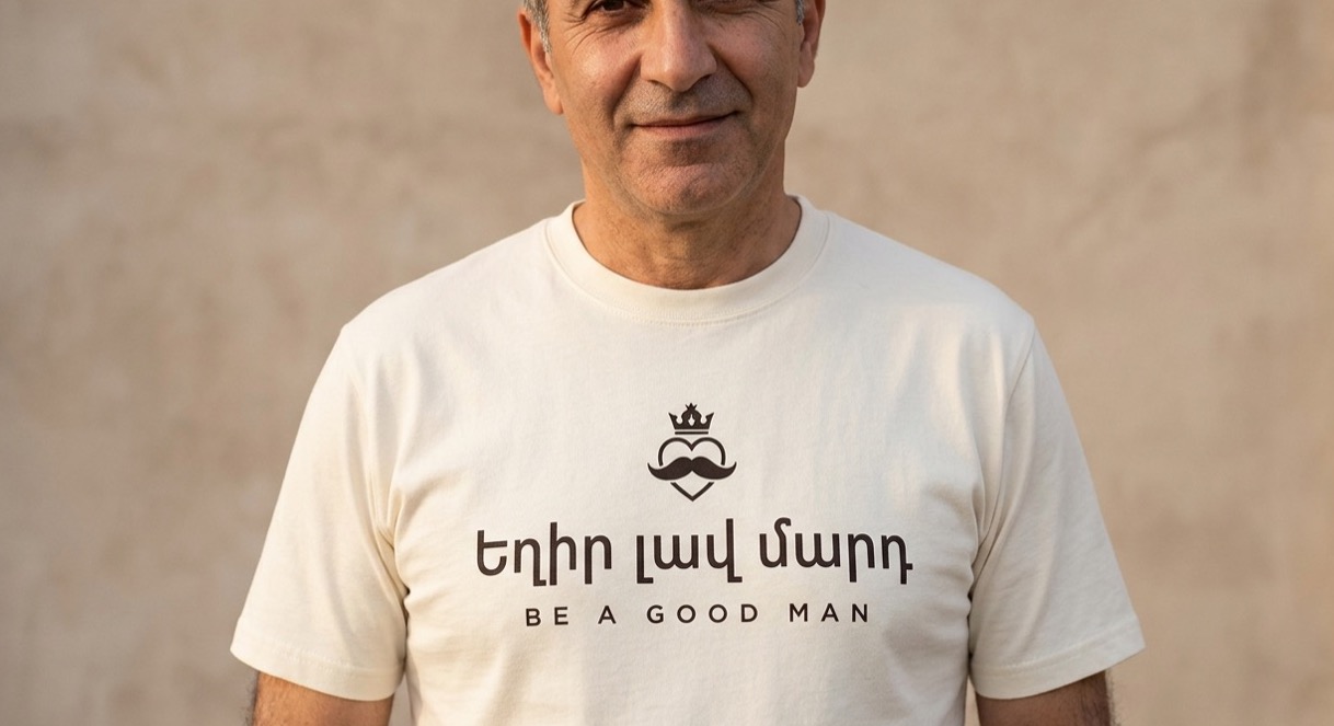 The Signature Tee — “Be a good man.”, worn. Antique Ivory.