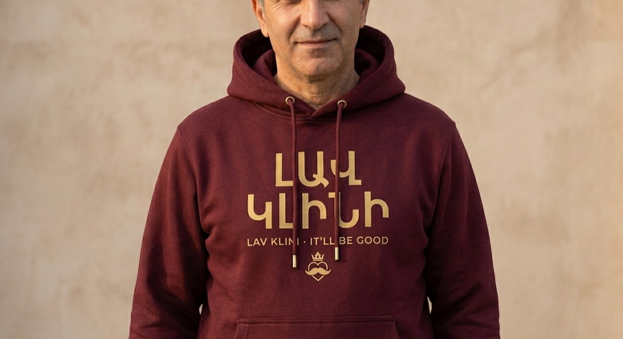 The Lav Klini Hoodie — “It'll be good.”, worn. Oxblood.